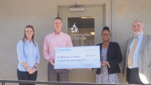Community In Schools Attorneys Kevin Holmes and Kelly Alfreds and Paralegal Glenis Haynes