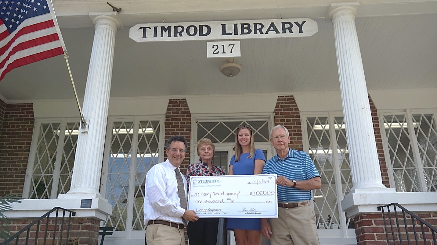 Timrod Library Donation With Attorney Steven Goldberg And Attorney Kelly Alfreds Brighter Version