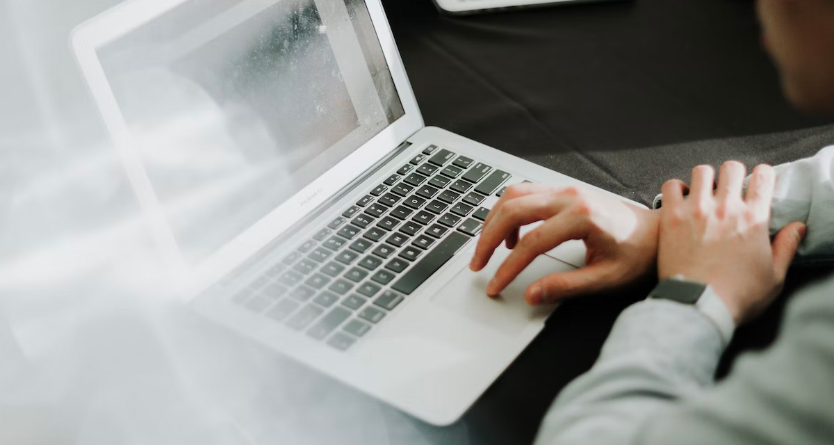 LFN Blogs 7 Man reading press release on laptop